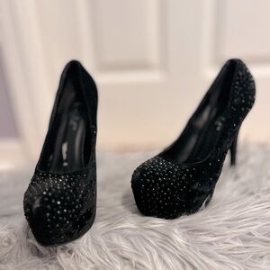 Black platforms with black rhinestones